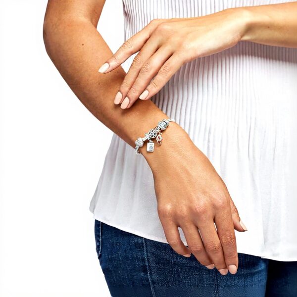 Bracciale Pandora maglia snake cuore pavè oro rosa zirconia